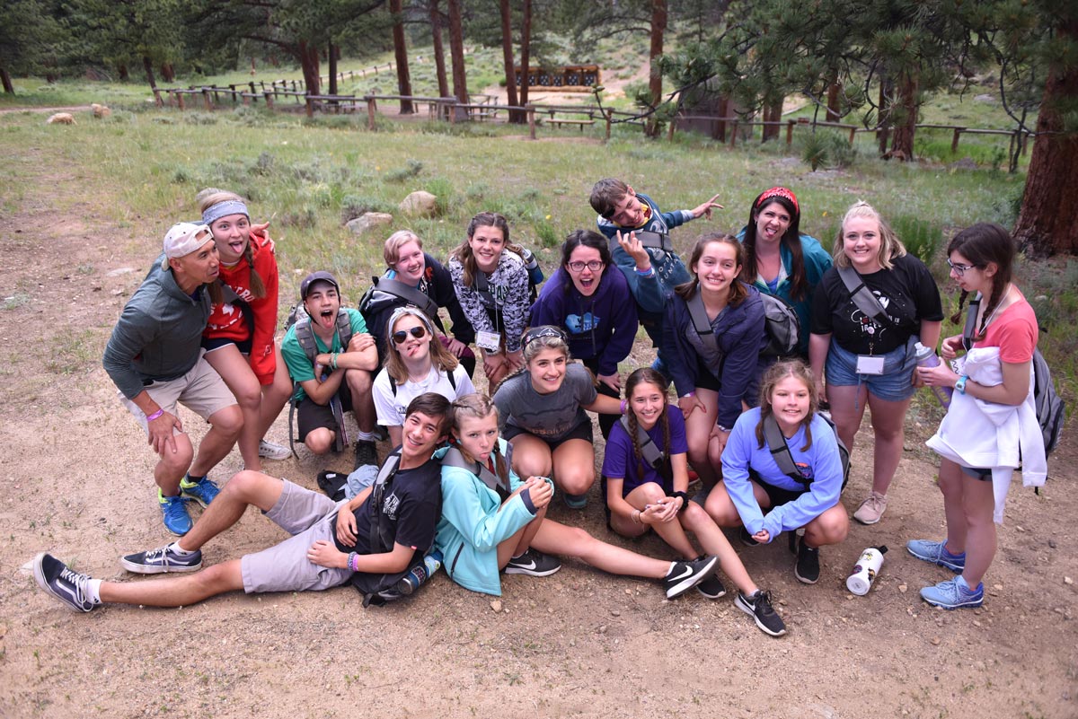 Campers pose for a photo during a hike