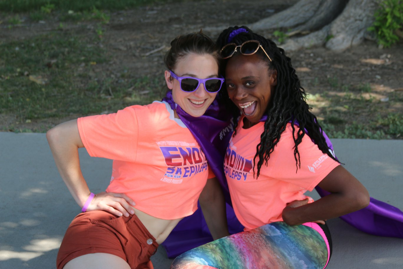 Two girls pose for a picture at the End Epilepsy run