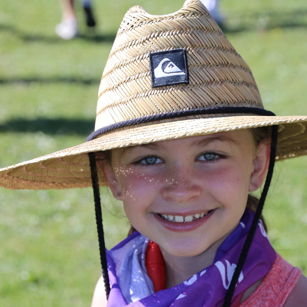 Girl smiling, wearing hat