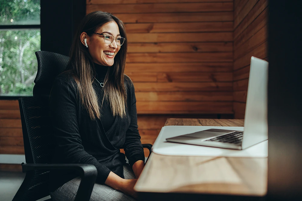 you woman on a meeting on a laptop